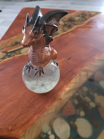 assorted apoxy dragon an skull sculptures , View more