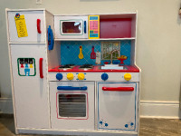 Toy kitchen with food and pots & pans
