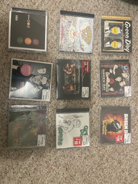 Punk rock cds. Green day, blink 182 and sum 41