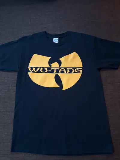 Vintage Wu Tang Clan shirt. Size: Large. Washed and hung dry. Never put in dryer. Great shape. No ri...
