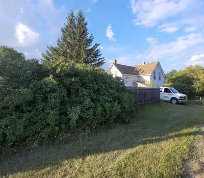 3 bedroom, 1 bathroom house with 1/2 acre of land. Fruit trees on property and a detached garage/she...