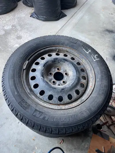 Set of four 225/65R17 winter tires mounted on steel rims. Came off a 2008 Escape. Tires are holding...