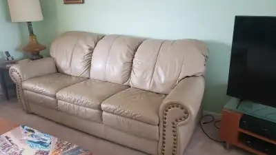 Great price! Leather Lazyboy couch and matching recliner. A bit of normal wear on armrests.