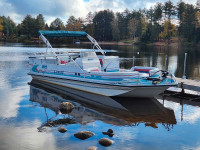 24' Lowe Deck Boat with 150 Evinrude eTec