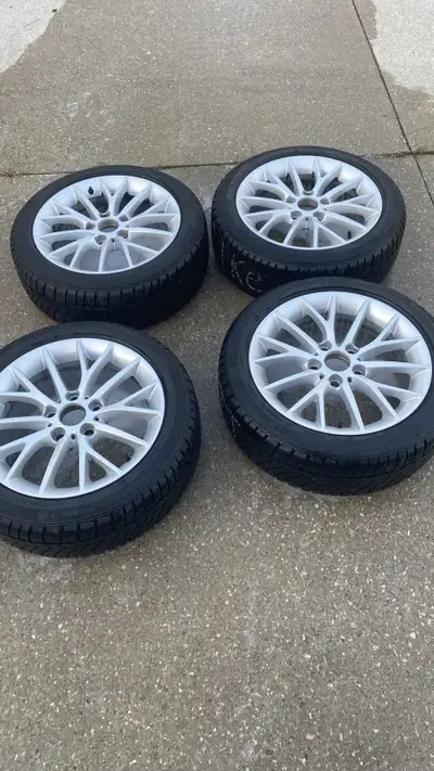 Selling a complete set of 4 Continental ContiWinterContact winter tires (205/50R17) mounted on alloy...