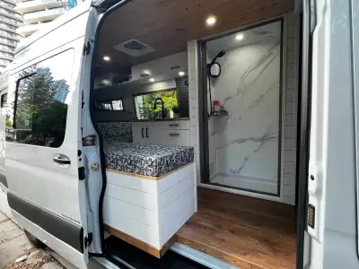 This 2020 Mercedes Sprinter 2500 high ceiling and extended cab (170” wheelbase) van is professionall...