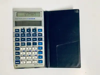 This pre-owned Texas Instruments TI-36 Solar scientific calculator is a reliable tool for advanced m...