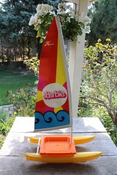 Vintage Barbie Hobie Cat Catamaran. The boat shows some wear and marks/light stains throughout. The...