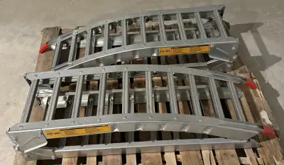 Pair of new folding arched steel loading ramps, 84”L x 12”W x 36”H, 1400lbs loading capacity, comes...