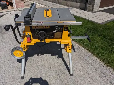 DW744 Dewalt 10" Jobsite Table Saw with rolling stand DW7440RS. Very good condition.