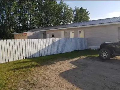 Step back in time with this unique 1976 mobile home, featuring a distinctive floor plan that offers...