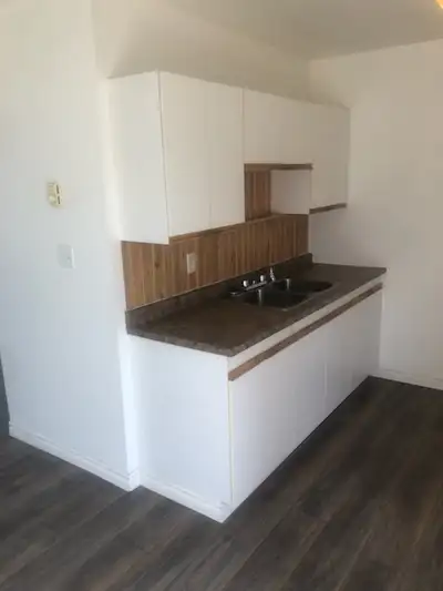 3 bedroom townhouse in Elliot Lake located steps to Spine Beach $1,750 per month plus utilities firs...