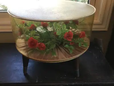 Rare Mid Century Modern vintage inflatable 1960s terrarium foot stool with red roses. Holds air and...