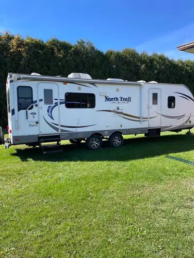 Couples trailer, sleeps 4. All appliances work great. Stove never used, only towed to campsites, new...