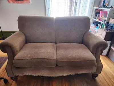 Brown loveseat. Some minor stains but in good condition otherwise. Comes from a house with 2 cats an...
