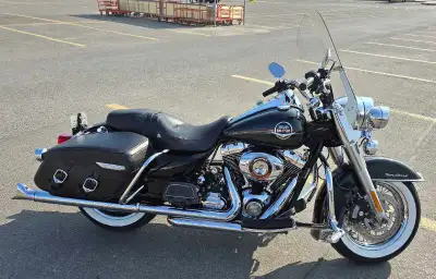 Black HD Road King Classic with fishtails. Awesome bike in great shape...runs smooth and loud. 96 cu...