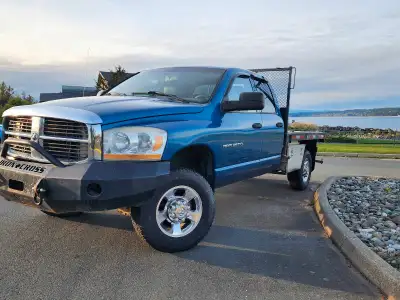 Ultimate adventure Rig.2006 Dodge Ram 3500 CUMMINS DIESEL 9ft long flat deck. Transmission was just...