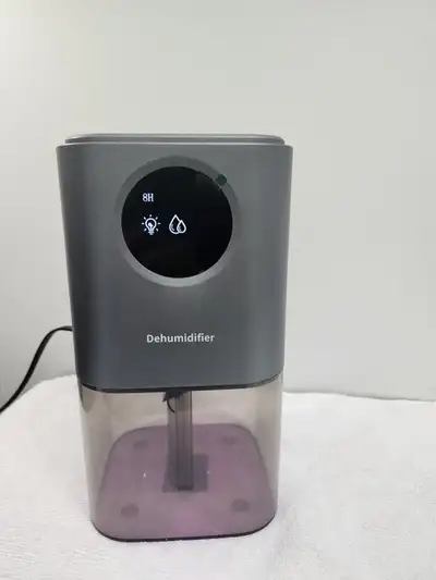 Mini Dehumidifier - $15, View more