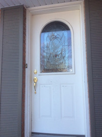 Entrance steel door with beautiful, genuine stained glass insert