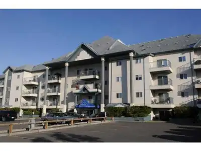 Upgraded 2 bedroom, 2nd floor green space facing patio. Functional kitchen with lots of cabinets wit...