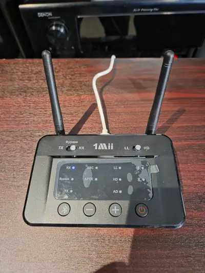 I'm selling a 1Mii B03 Bluetooth transmitter and receiver, a 2-in-1 device perfect for versatile aud...