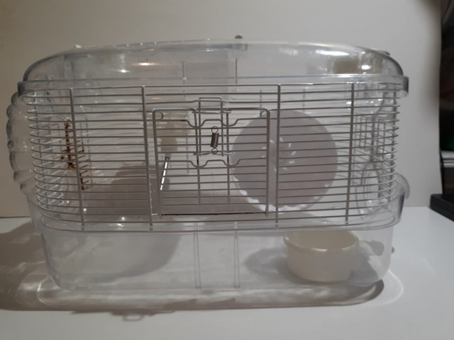 Cage de hamster avec accessoires en bon état 40x25x25 cm dans Accessoires  à Ville de Montréal