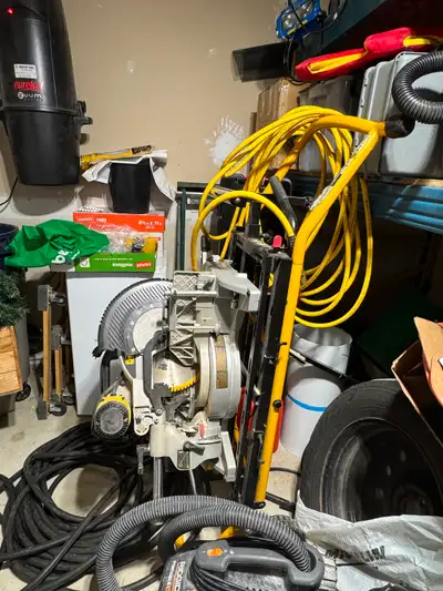 Dewalt 12” sliding mitre saw on rolling stand