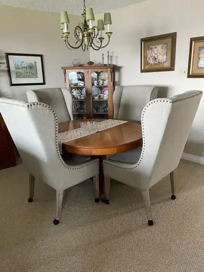 Beige fabric, beige wooden legs, on castors, no stains. Seat width 21”, seat depth 16.5”, height fro...