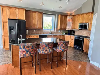 Used kitchen cabinets and island, View more