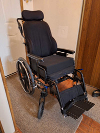 Adult wheelchair with head rest