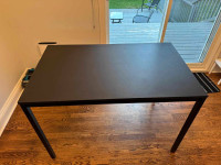 Ikea four-person dining table - used