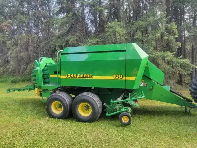 John deere 100 big square baler. Makes 3x3x8ft bales has harvest tec hay preserver 1000 pto takes 10...