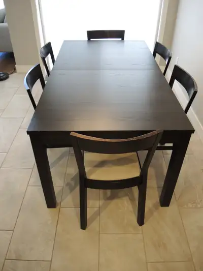 Ikea table, 2 leafs, 6 chairs, 175 cm X 95 cm, with leafs 260 cm, 1 leaf has a flaw otherwise good c...