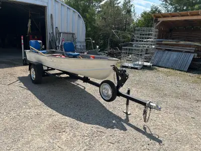 14' Starcraft Seascamp 1996, no leaks. 1992 Suzuki 15hp two stroke oil injected runs great. Trailer...