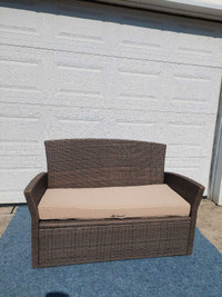 Wicker Loveseat and cushion (Possible delivery)