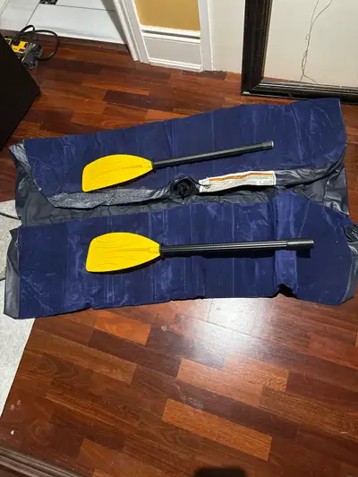 Get ready for some fun in the sun with this pre-loved Intex inflatable kayak, designed for two peopl...
