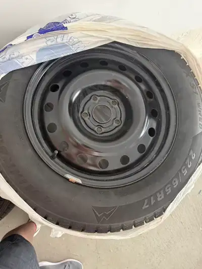 Selling a set of 4 winter tires with steel rims. Used for less than one season (under 5,000 km). Siz...