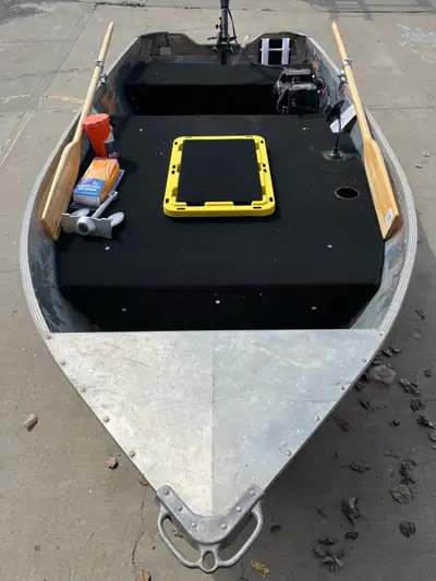 12’ aluminum Sears Game fisher -Carpeted casting deck -64 liter dry storage - 55 pound thrust minn k...