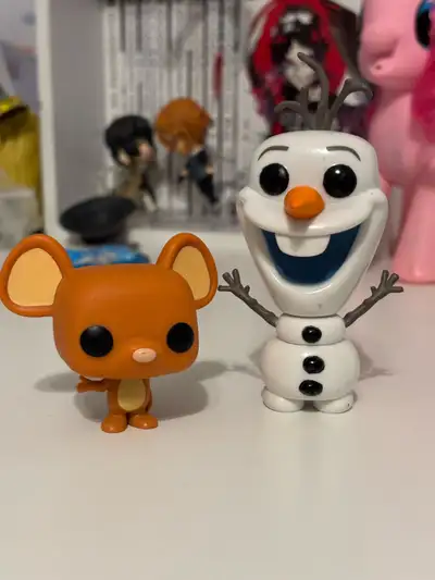2 Disney Funko Pops Gus-Gus and Olaf in good condition! (They just need a good wash) Both for 5$! Pi...
