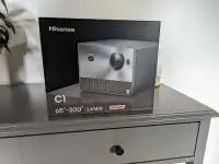 Hisense C1 Trichroma Laser 4K UHD Mini Projector with Dolby 