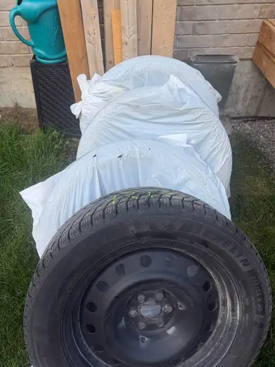20” Michelin X -Ice SUV snow tires on steel rims. Used 3 seasons, fits 24-27 Chev Traverse and GMC A...