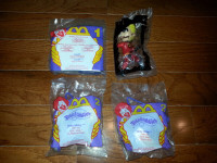 Bundle of 4 sealed Mcdonalds toys (Aladdin, Teletubbies, etc)