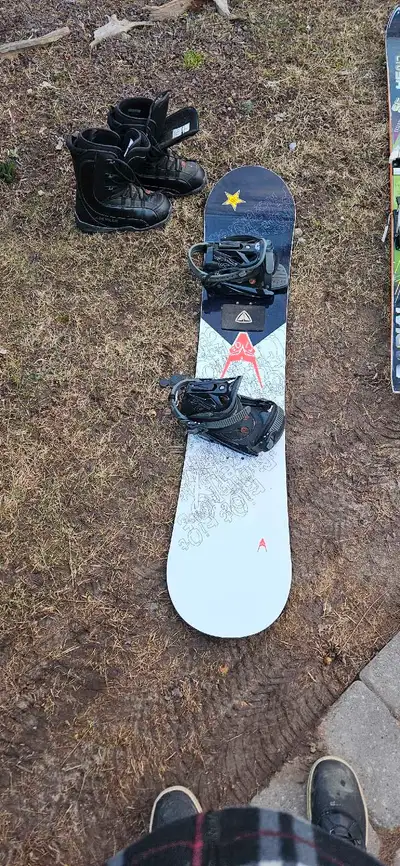 Snowboard and boots, perfect for hitting the slopes! This set includes a snowboard with bindings and...