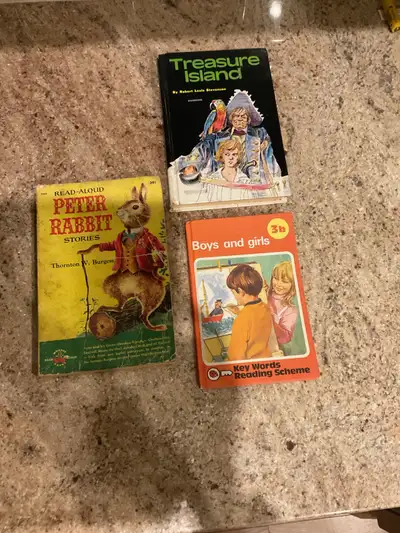 Collection of 3 vintage children's books, including an original "Treasure Island", "Peter Rabbit Sto...