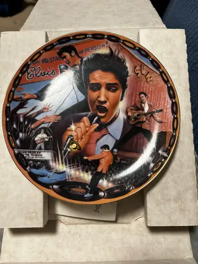 Numbered, Bradford exchange, Elvis Presley musical plate. Has the COA and still in box. Had since ne...