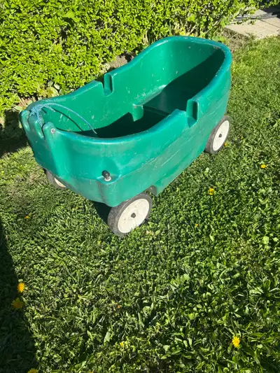 $20 for 2 seats kid’s children green wagon Plus has 2 cups holders and string already tie to pull ve...