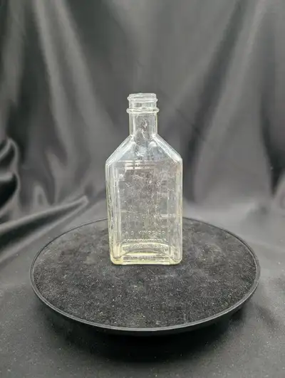 A vintage glass bottle of Hinds Honey and Almond Cream. The A. S. Hinds Company was established in 1...