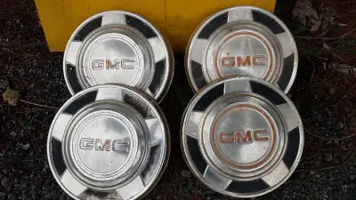 Caps from about 1970 or 1974 GMC truck. $ 75.00 Made from stamped aluminum . Call 506-650-8131