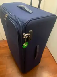 Samsonite - large travel suitcase