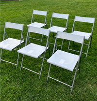 6 White Plastic Folding Chairs - Like New -Sturdy